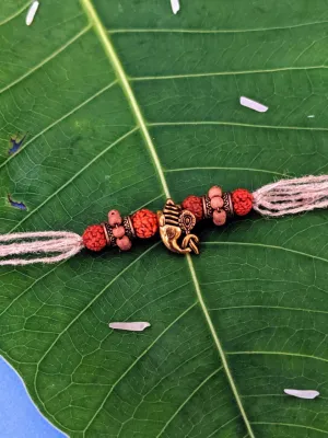 Antique Rakhi Design Ganesha Face with Rudraksha/Tulsi Beads Pendant Mauli Thread For Raksha Bandhan