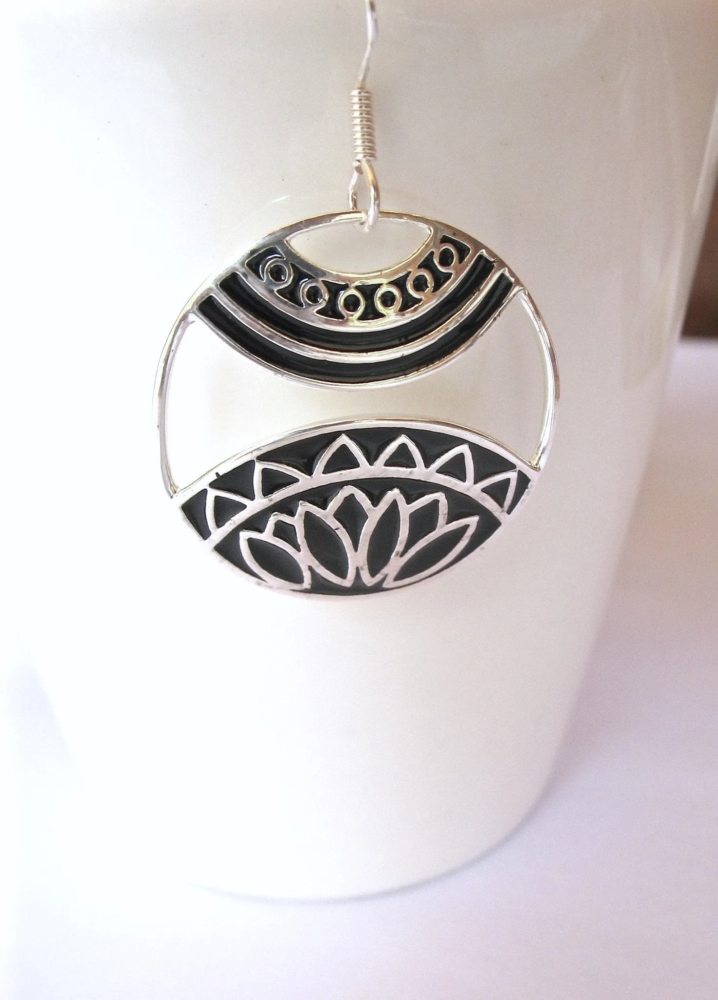 Beautiful, artistic, round dangling earrings with fine black enamel work