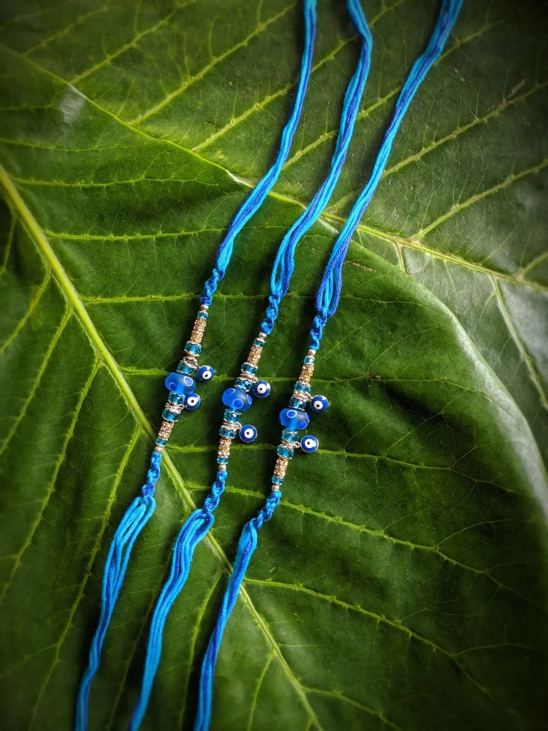 (COMBO of 3) Fancy Evil Eye Rakhi Design Turkish Charm Multicoloured Mauli Raksha Bandhan