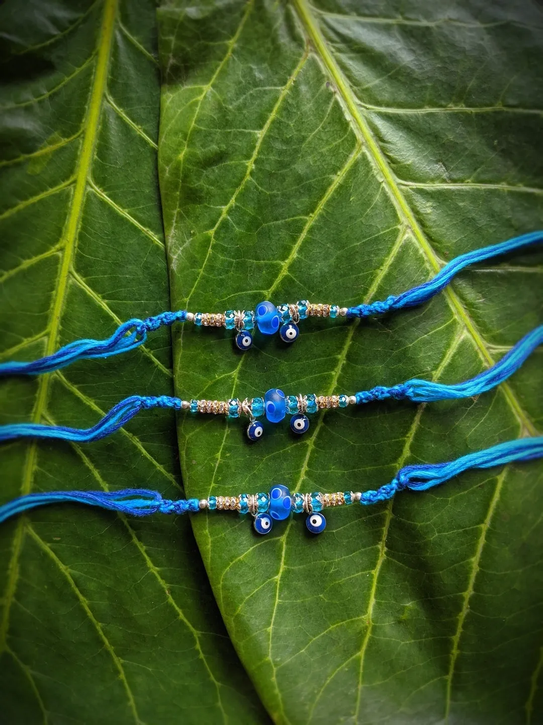 (COMBO of 3) Fancy Evil Eye Rakhi Design Turkish Charm Multicoloured Mauli Raksha Bandhan