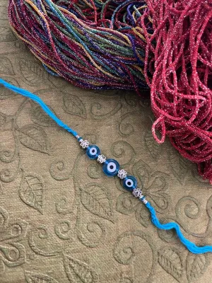 Fancy Evil Eye Rakhi Designs Nazariya with Flower Turkish Charm Mauli Raksha Bandhan