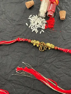 Fancy Rakhi Designs Elephant/Ganesh Ji with Rudhraksha Multicoloured Mauli Thread Raksha Bandhan