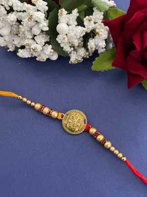 Fancy Rakhi Designs Ganesh Ji Pendant Cream Color Beads Multicoloured Mauli Thread Raksha Bandhan