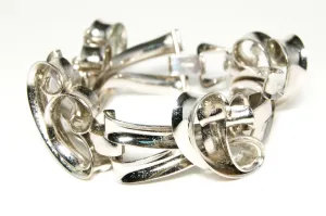 Napier Modernist Silver Large Link Curving Interlocking Artistic Sculptural Link Bracelet Silver Tone